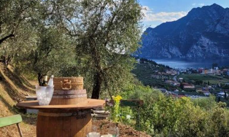 Rustic table with mountain and lake view.